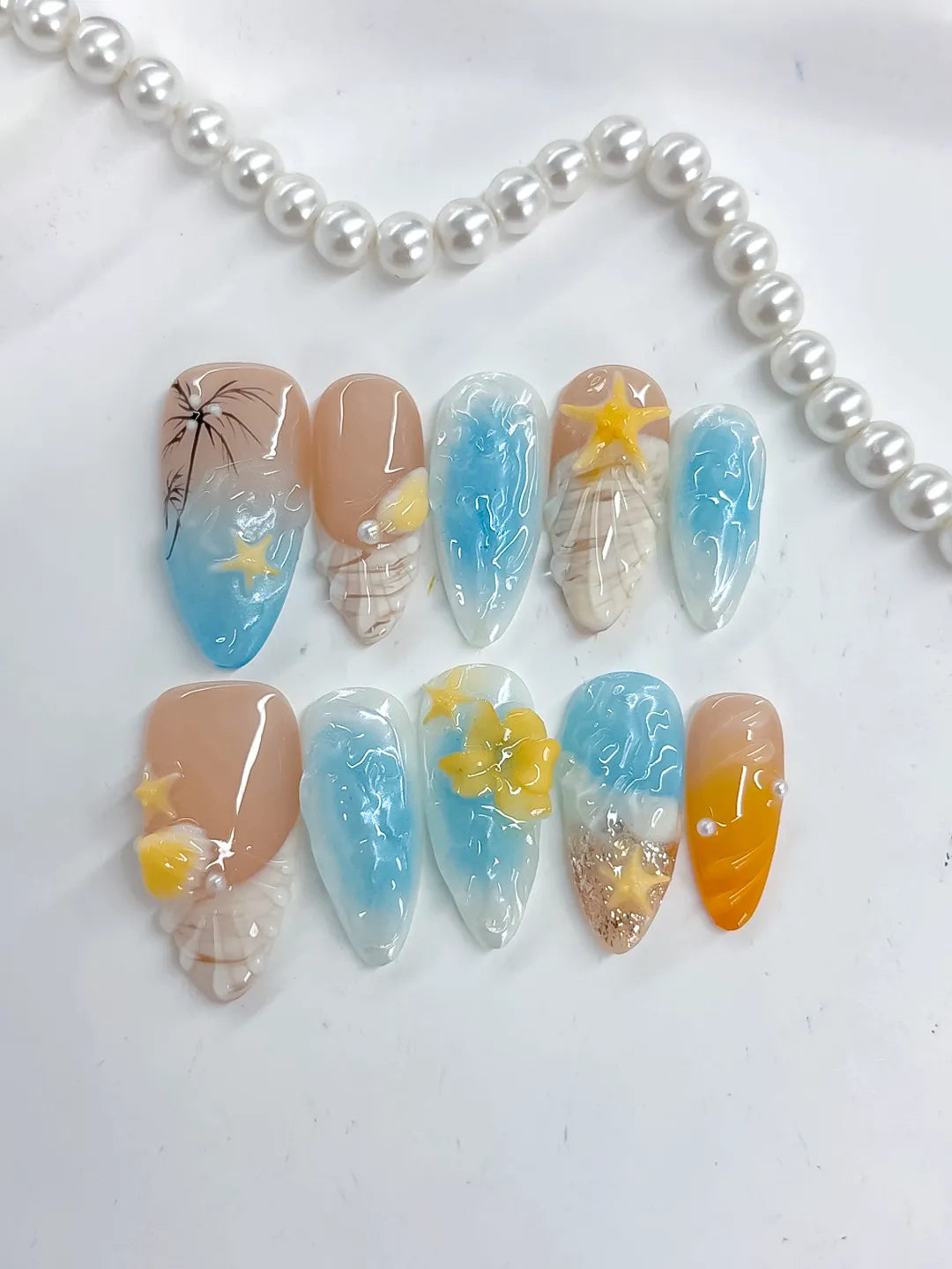 Nude Blue Yellow White Abstract Flower Star Shell press on nails detail view
