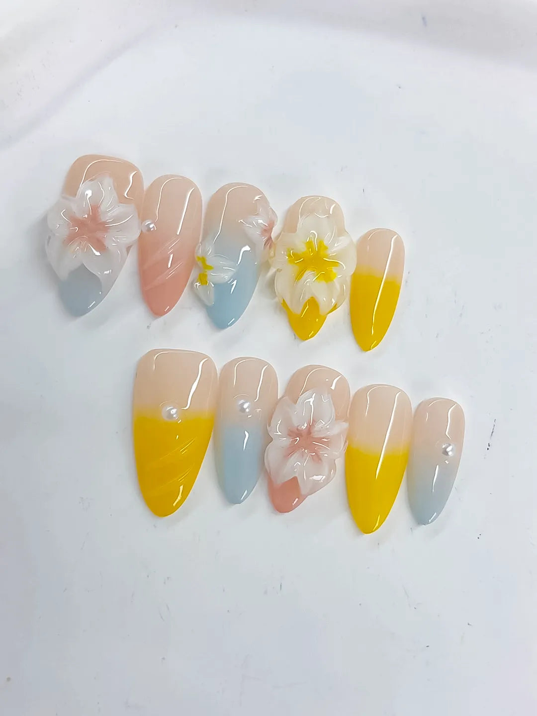 Nude Yellow Blue White French tip Flower Pearl press on nails close up