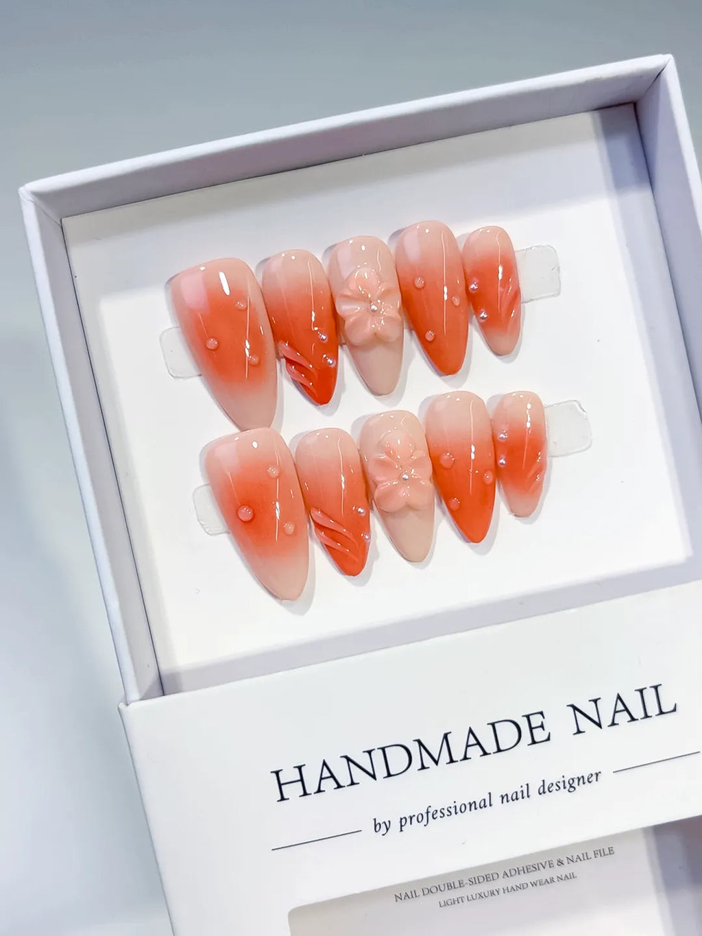 Orange Ombre Flower Rhinestone press on nails angled view