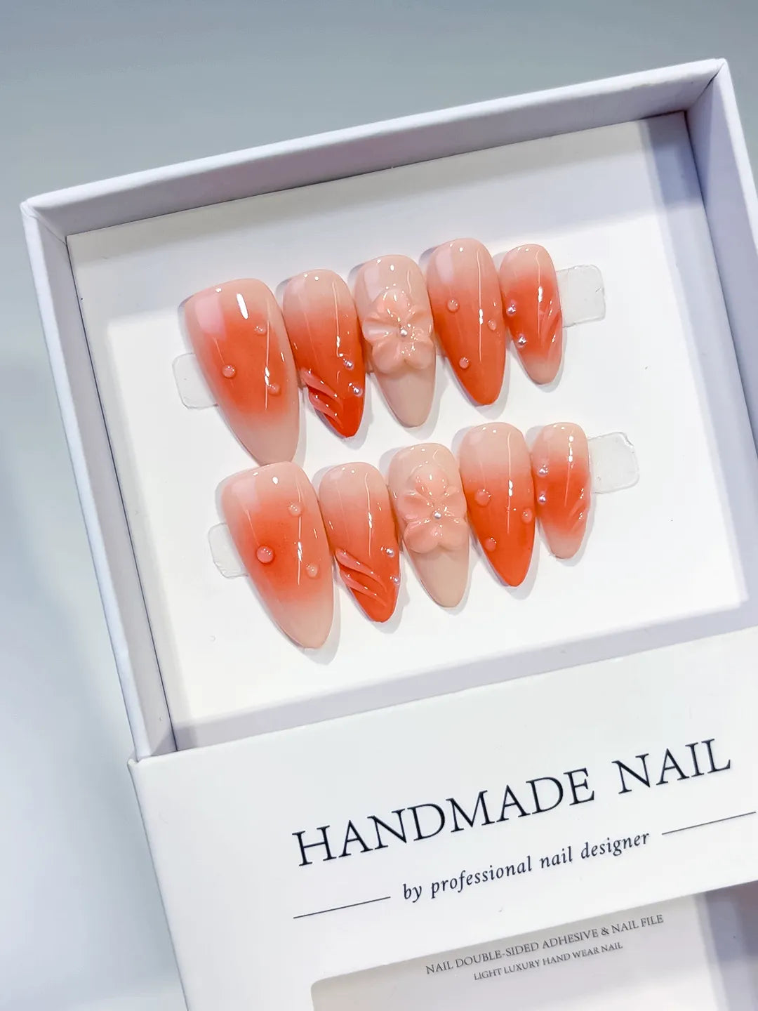 Orange Ombre Flower Rhinestone press on nails angled view