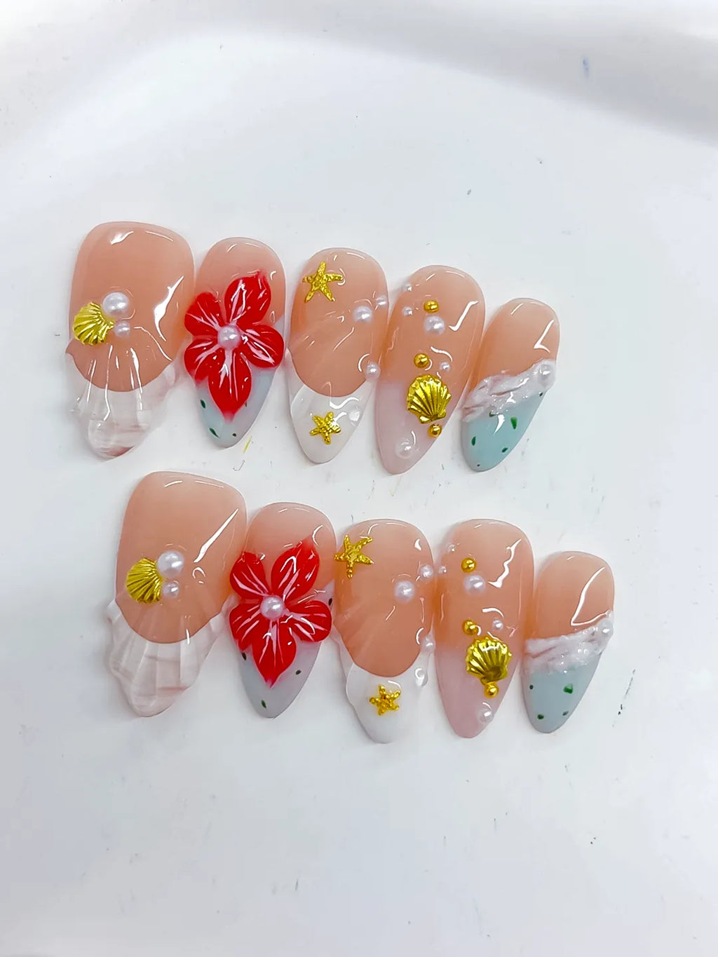 Nude White Red Gold French tip Flower Star Shell press on nails close up