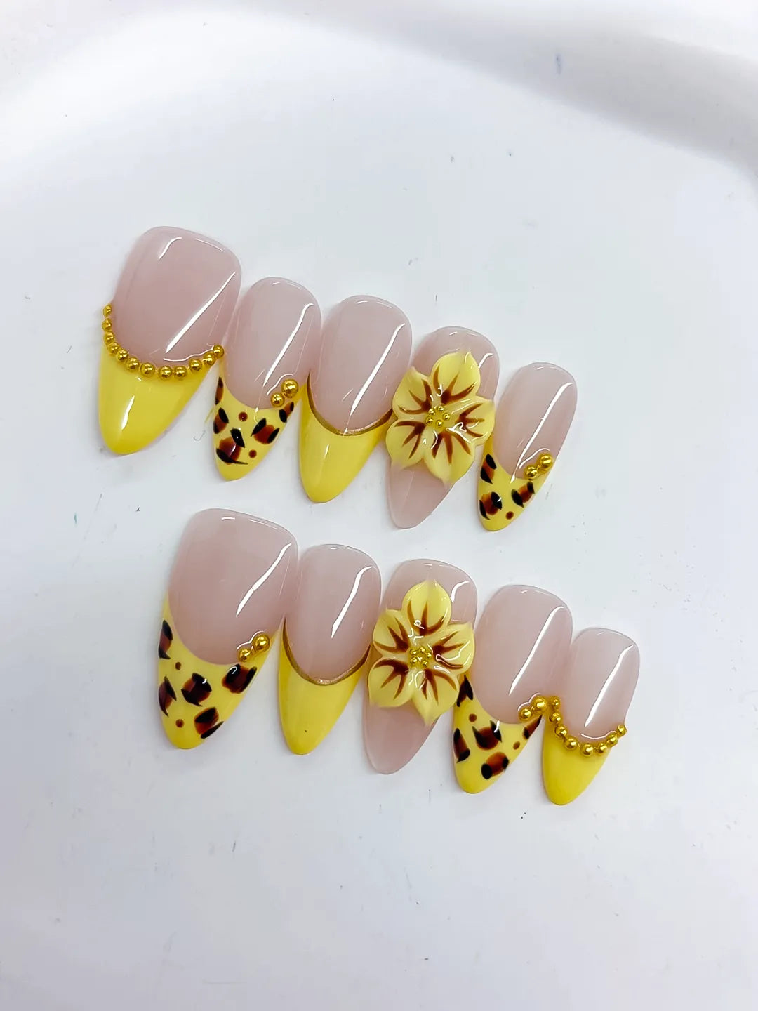 Nude Yellow Black Gold French tip Flower Animal Print Metallic Charm press on nails detail view