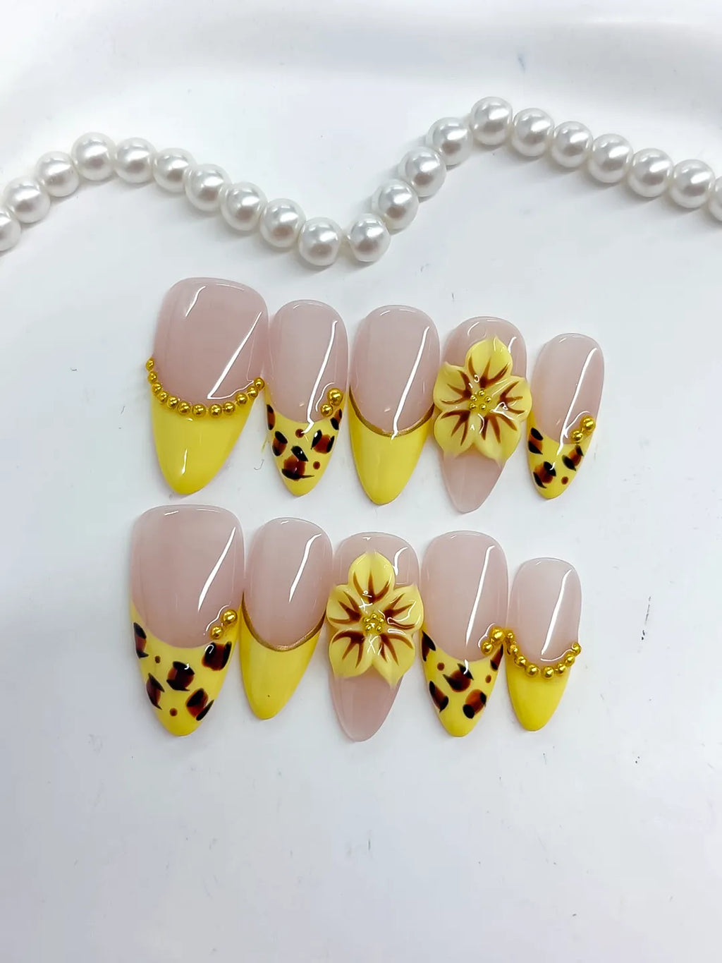 Nude Yellow Black Gold French tip Flower Animal Print Metallic Charm press on nails detail view