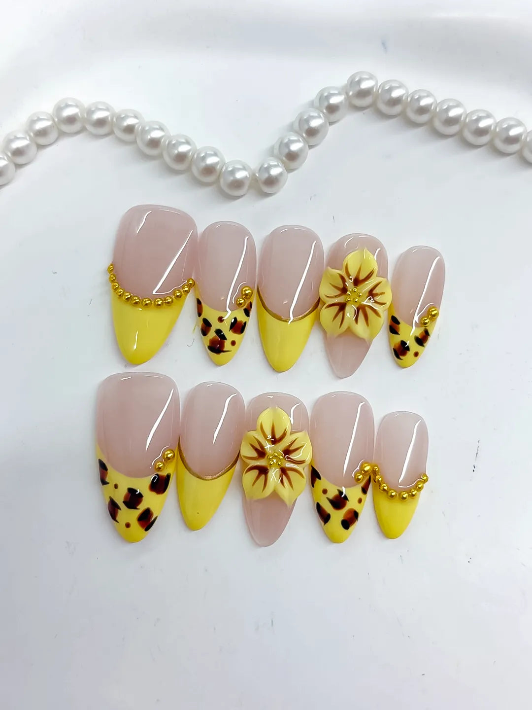 Nude Yellow Black Gold French tip Flower Animal Print Metallic Charm press on nails detail view