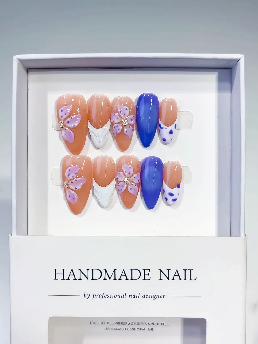 Nude Blue White Purple French tip Flower Dot Pattern press on nails angled view