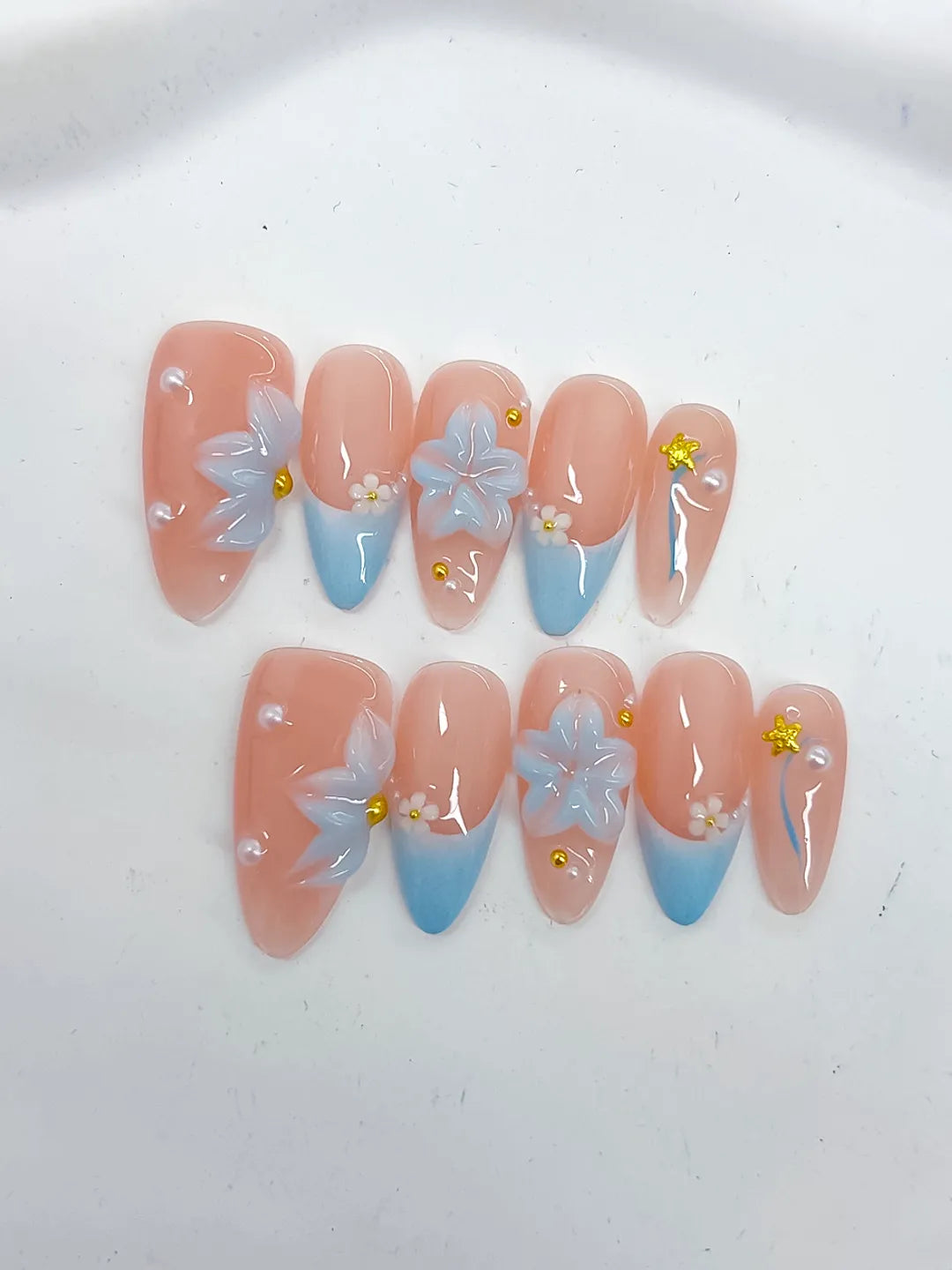 Nude Blue French tip Flower Star Rhinestone press on nails close up
