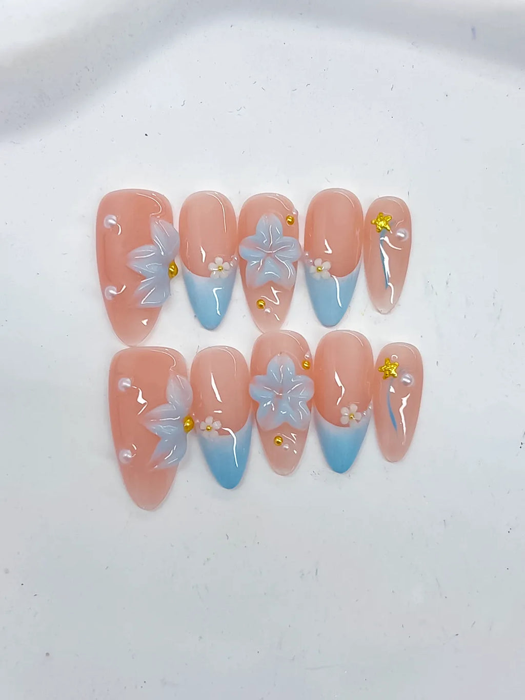 Nude Blue French tip Flower Star Rhinestone press on nails detail view