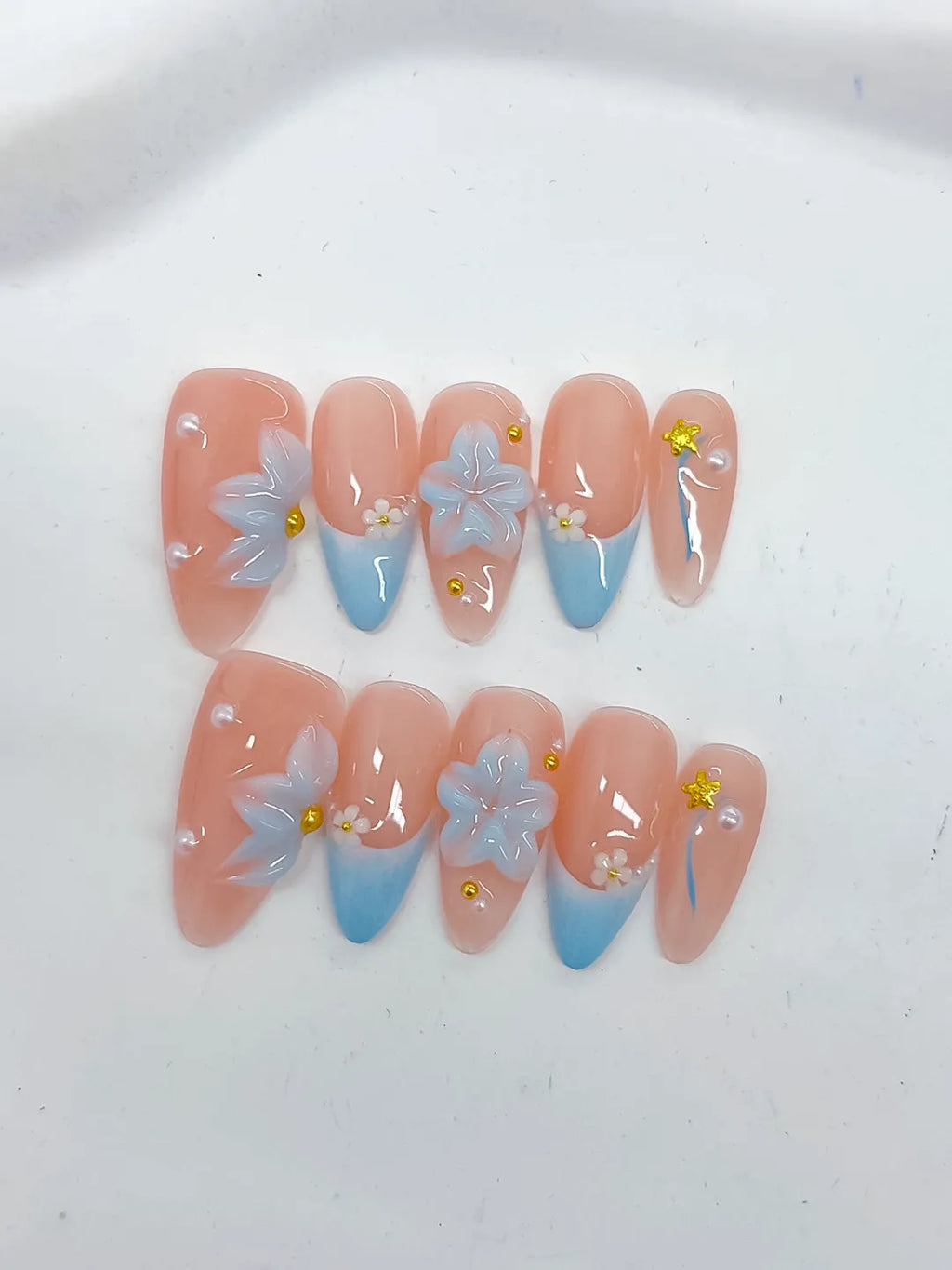 Nude Blue French tip Flower Star Rhinestone press on nails detail view