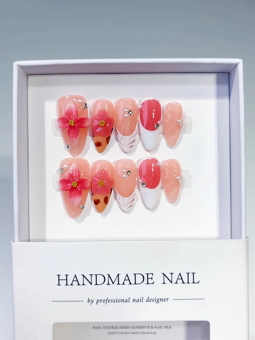 Nude Orange White Brown French tip Flower Animal Print Rhinestone press on nails full set view