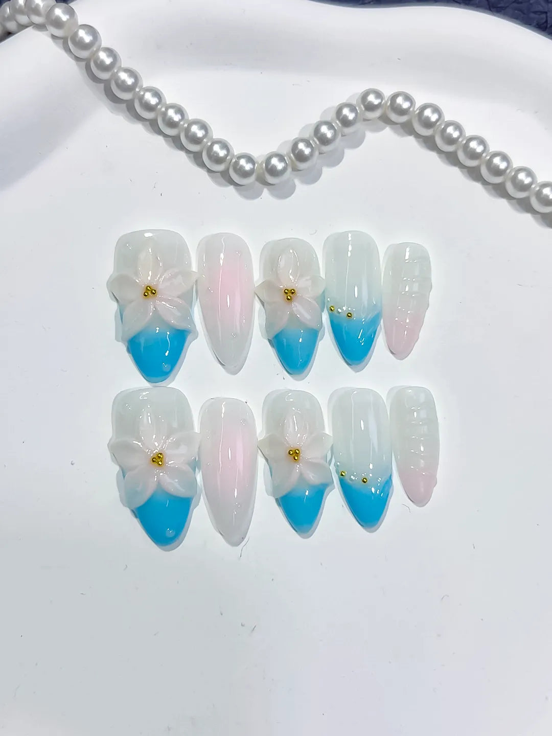 White Blue Pink French tip Flower press on nails close up