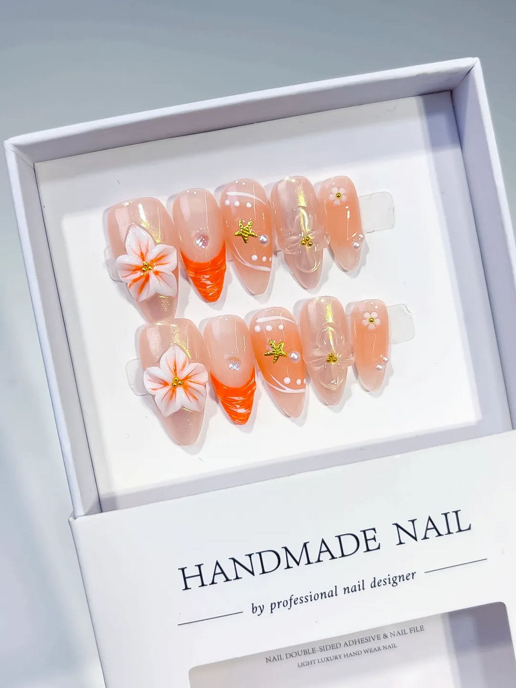 Nude Orange Silver Holographic Flower Star Dot Pattern press on nails angled view