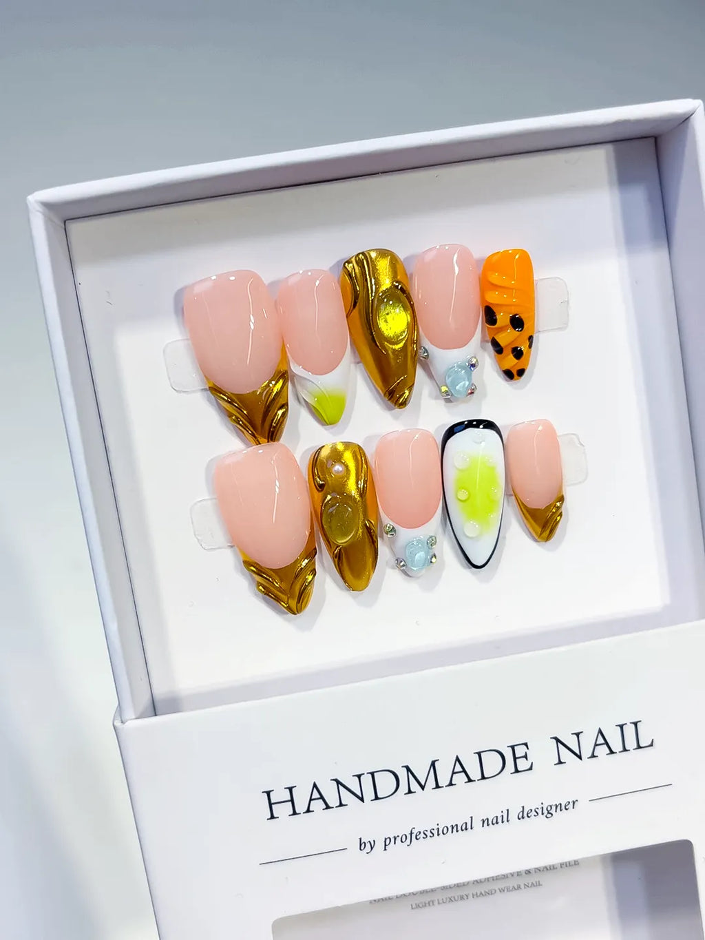 Nude Gold Green Orange Black Metallic Animal Print Rhinestone press on nails angled view