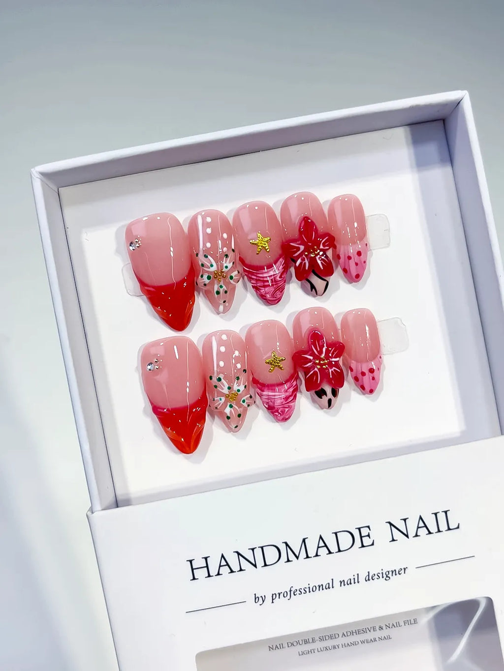 Pink Red White Gold Black Abstract Flower Star Animal Print press on nails angled view