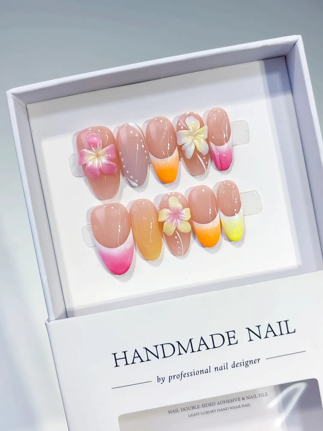 Pink Yellow Orange French tip Flower Pearl press on nails angled view