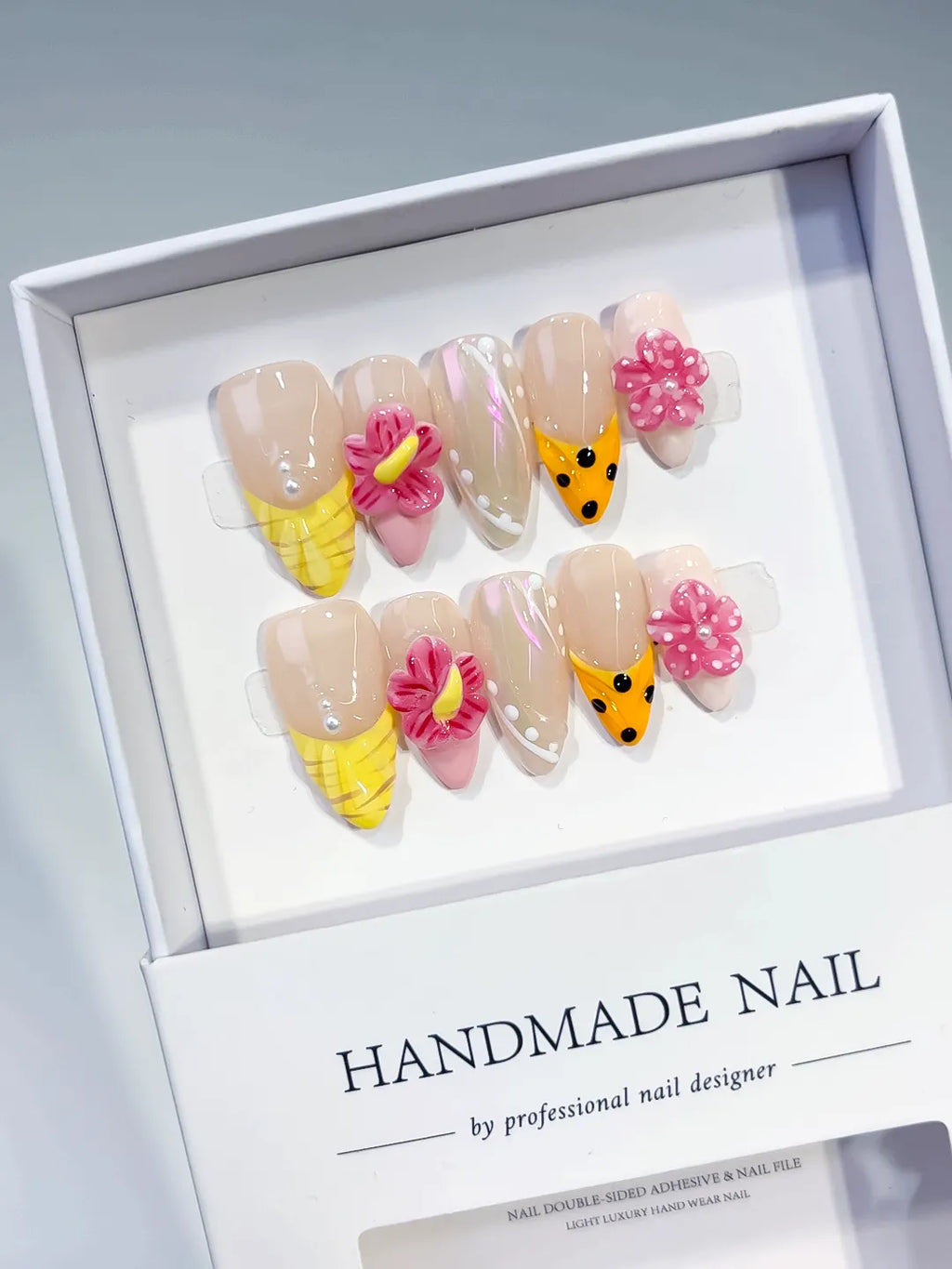 Nude Yellow Pink White Silver Holographic Flower Dot Pattern press on nails angled view