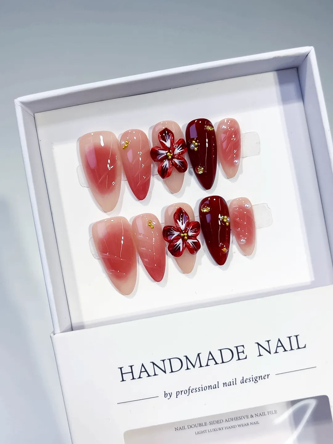 Pink Red Gold Ombre Flower Stud press on nails angled view