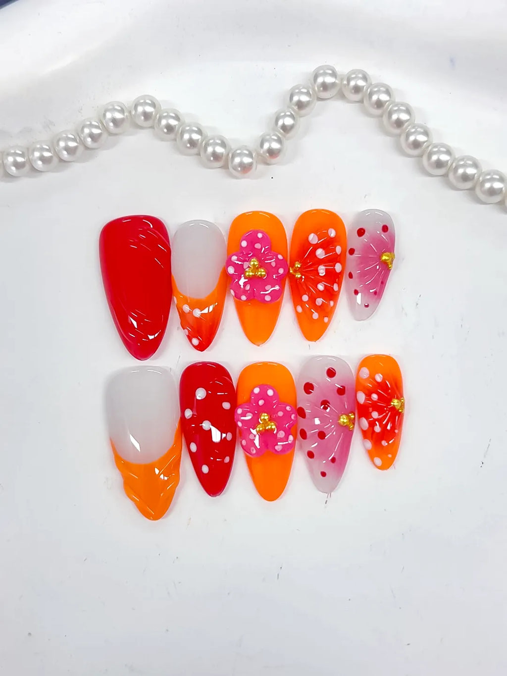 Red Orange White Pink Abstract Flower Dot Pattern Stud press on nails close up