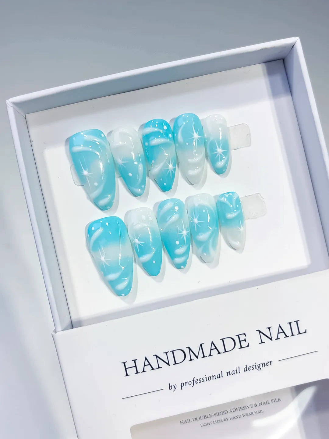Blue White Metallic Star press on nails angled view