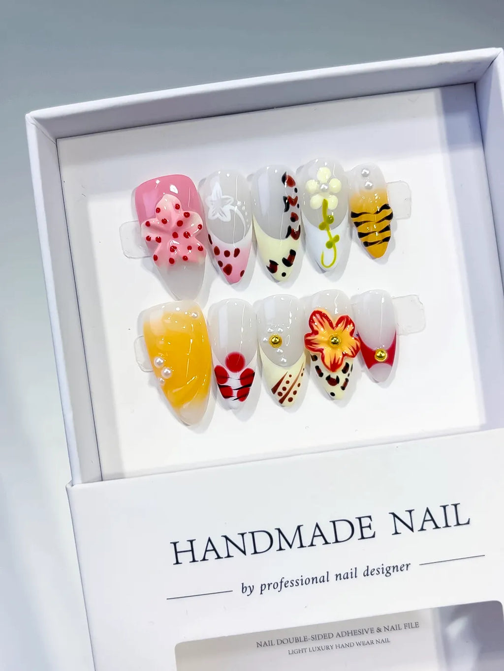 Pink Yellow White Red Black Abstract Flower Bee Fruit press on nails angled view