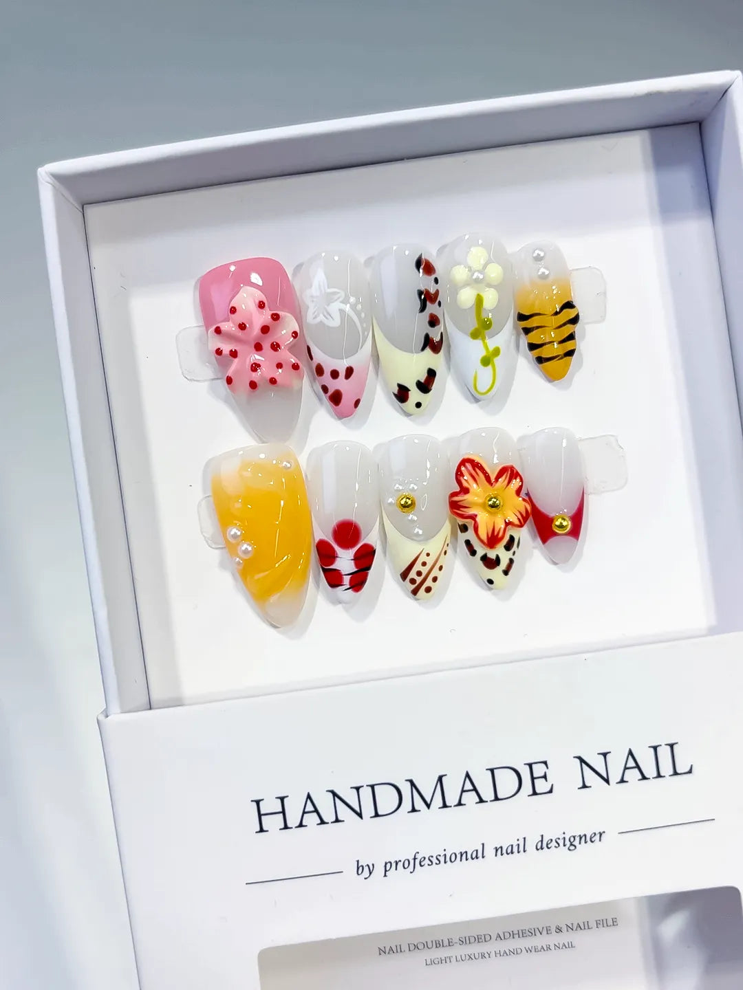 Pink Yellow White Red Black Abstract Flower Bee Fruit press on nails angled view