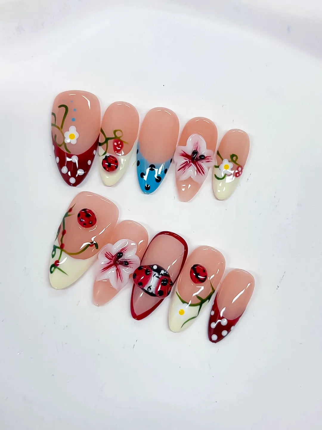 Nude Red White Blue Abstract Flower Ladybug Strawberry press on nails detail view