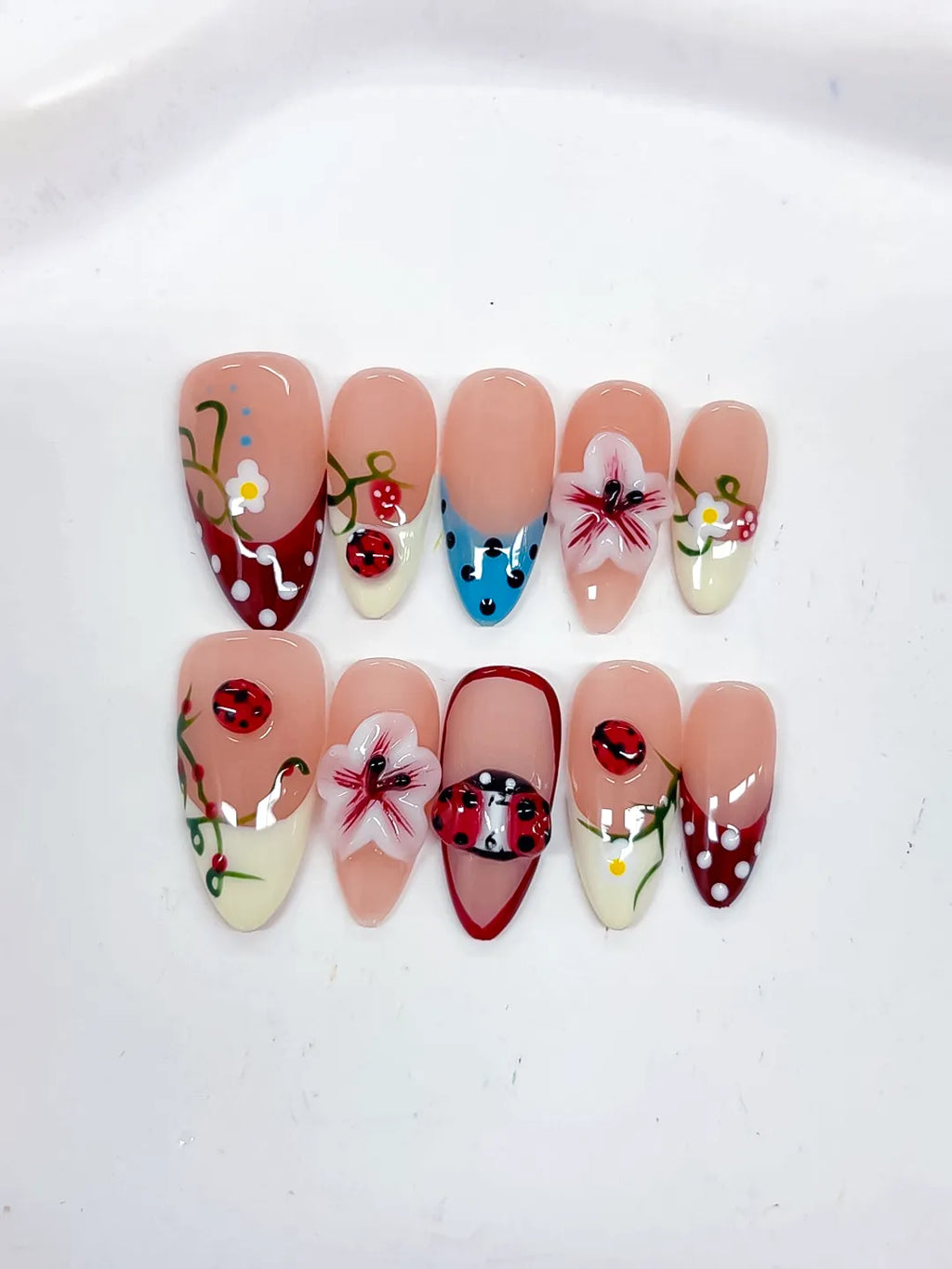Nude Red White Blue Abstract Flower Ladybug Strawberry press on nails detail view
