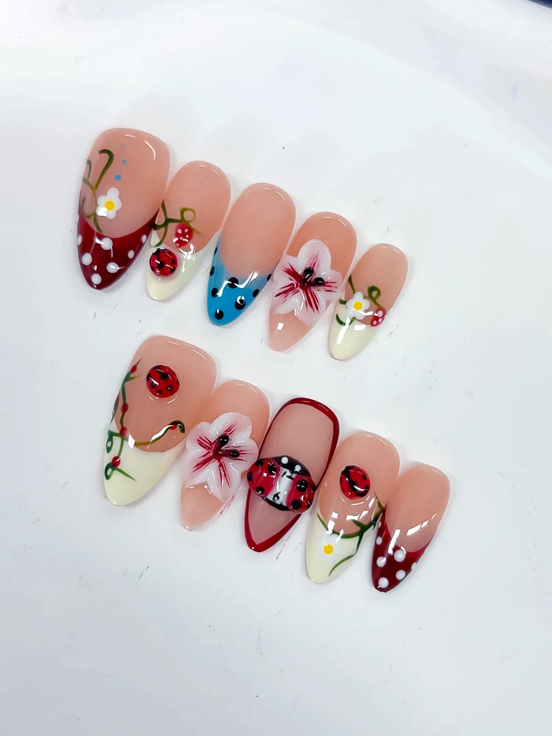 Nude Red White Blue Abstract Flower Ladybug Strawberry press on nails detail view