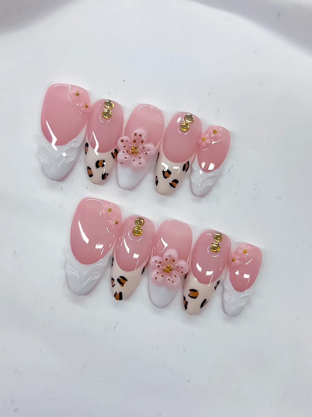 Pink White Brown Gold French tip Flower Animal Print Stud press on nails close up