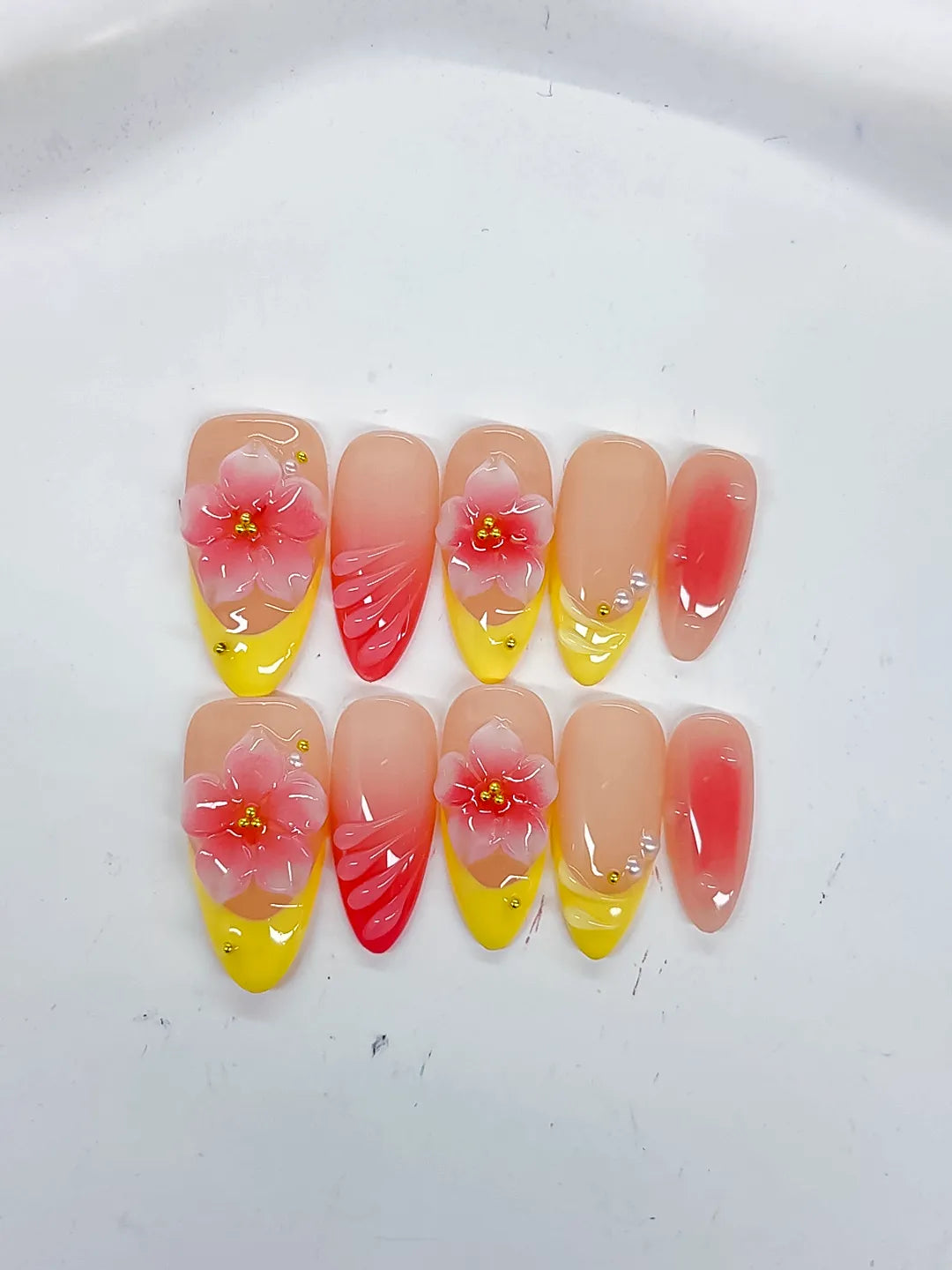 Nude Yellow Pink French tip Flower Shell press on nails close up