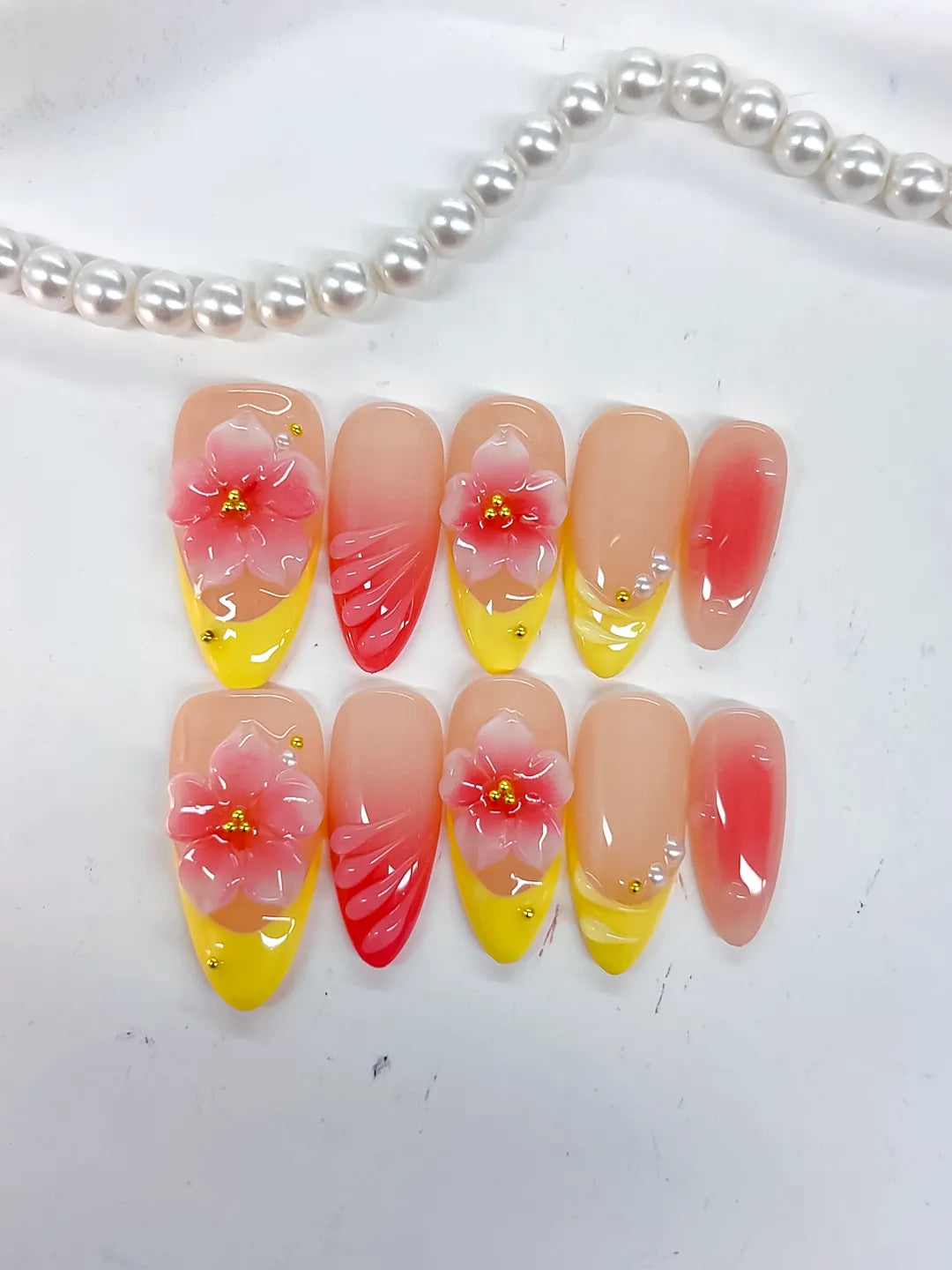 Nude Yellow Pink French tip Flower Shell press on nails detail view