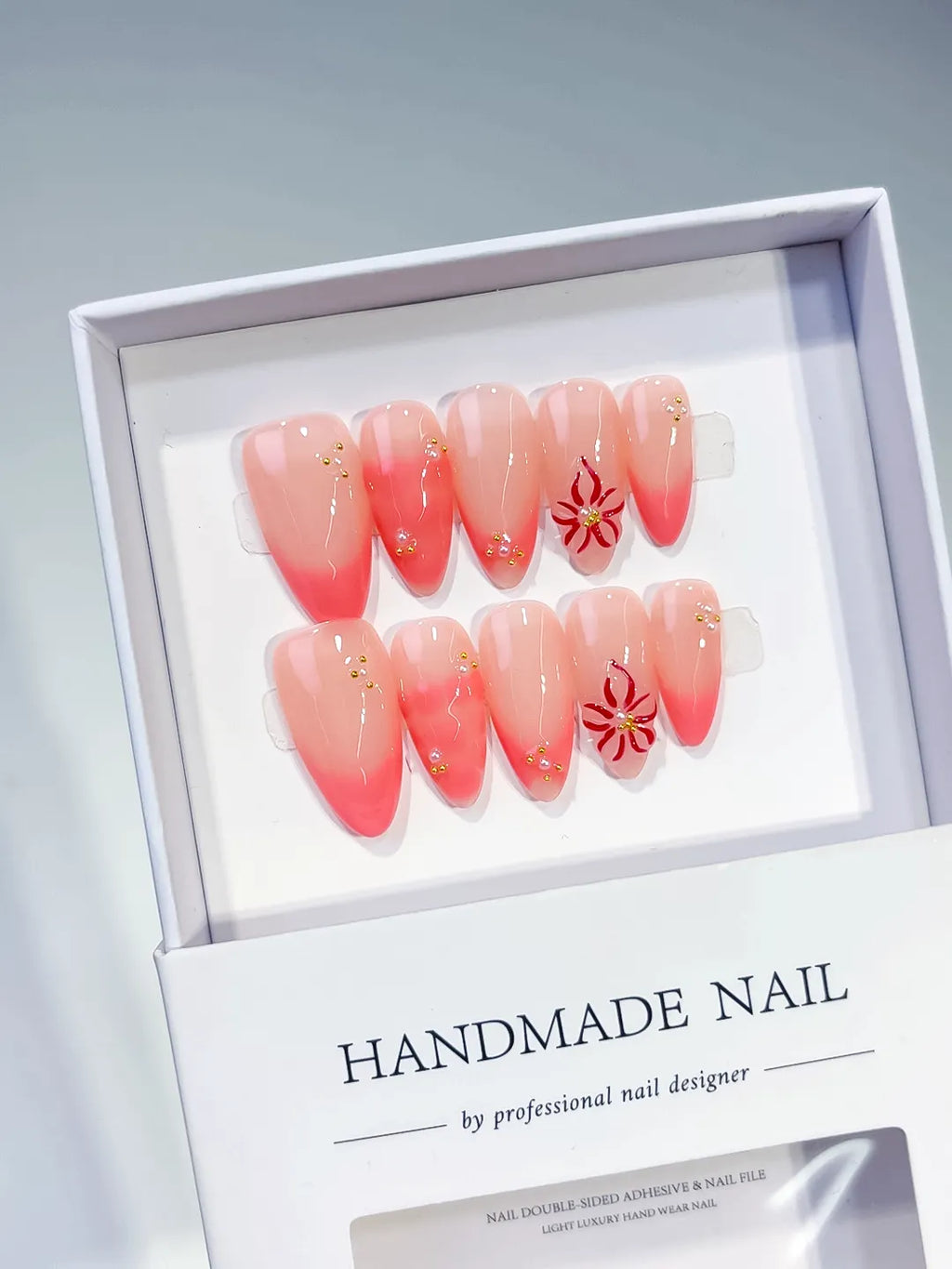 Pink Ombre Flower Stud press on nails angled view