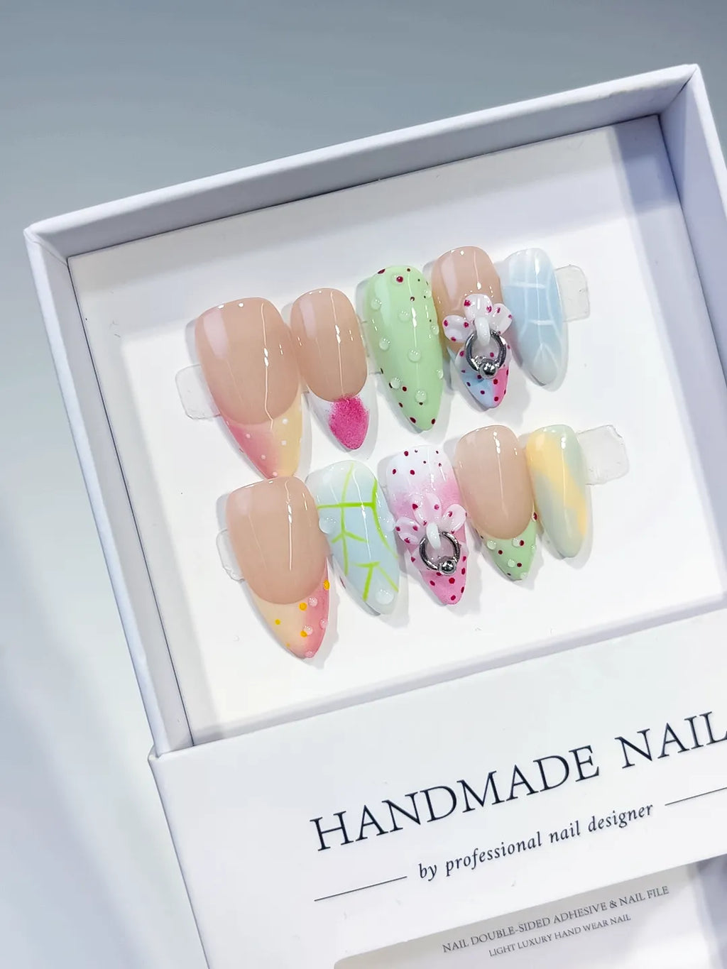Nude Pink Green Blue Yellow White Abstract Flower Heart Dot Pattern Metallic Charm press on nails angled view