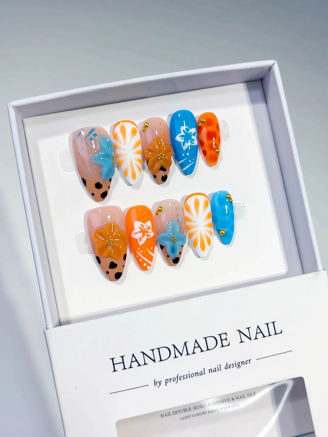 Nude Orange Blue White Black Abstract Flower Fruit Animal Print press on nails angled view