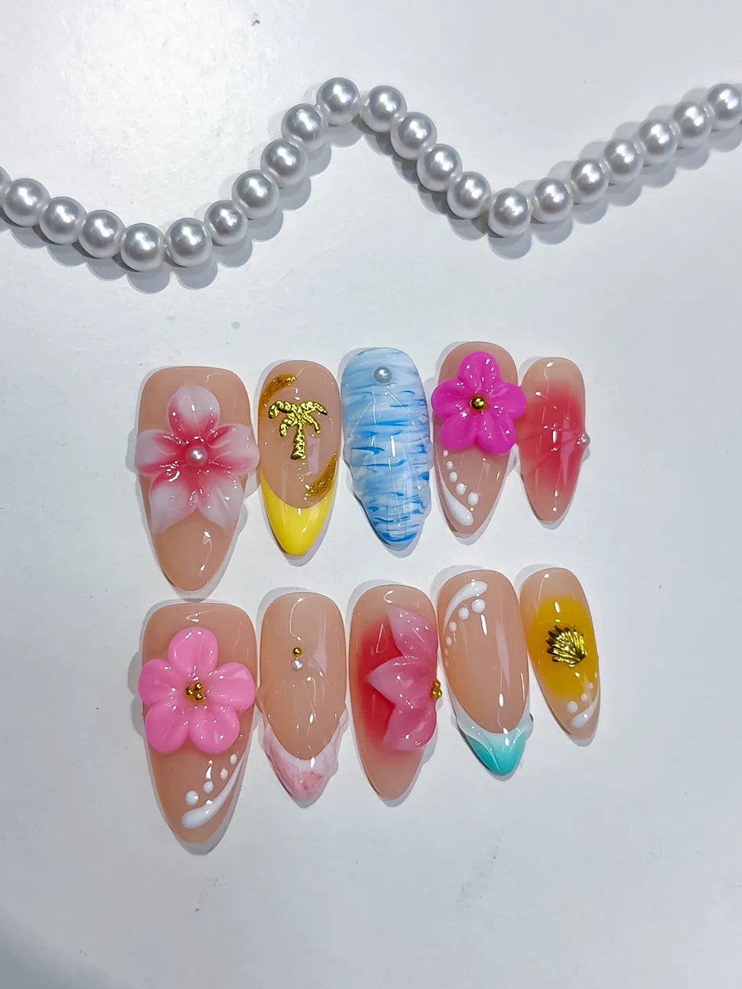 Nude Pink Blue Yellow White Abstract Flower Star Shell press on nails detail view