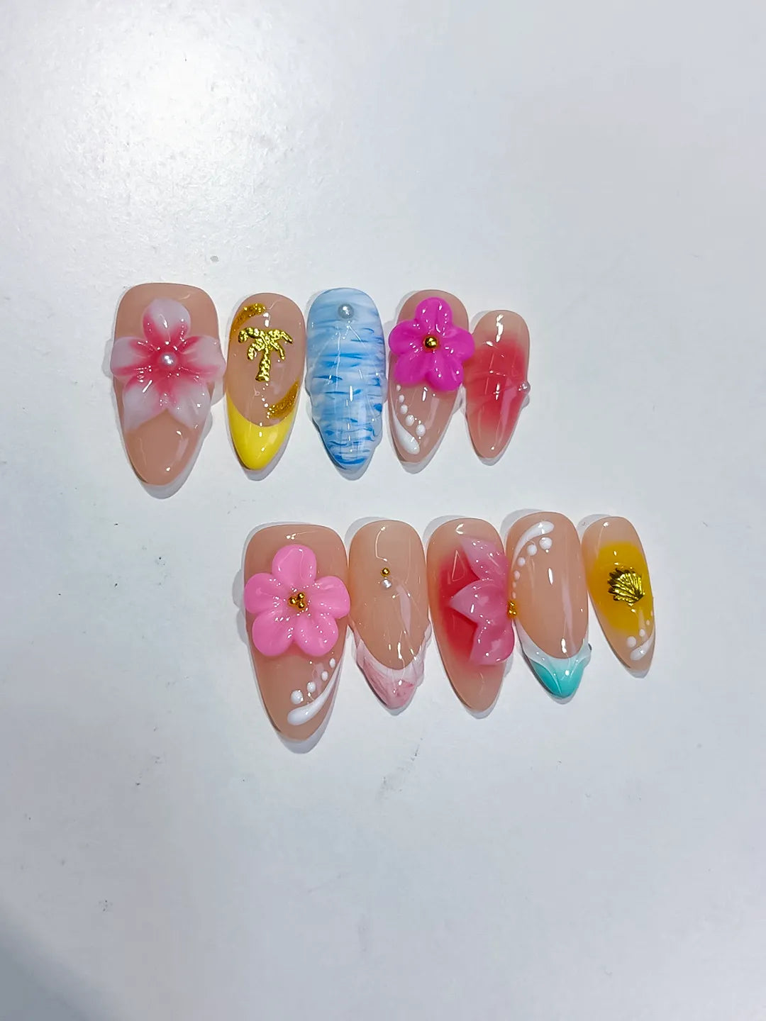 Nude Pink Blue Yellow White Abstract Flower Star Shell press on nails detail view