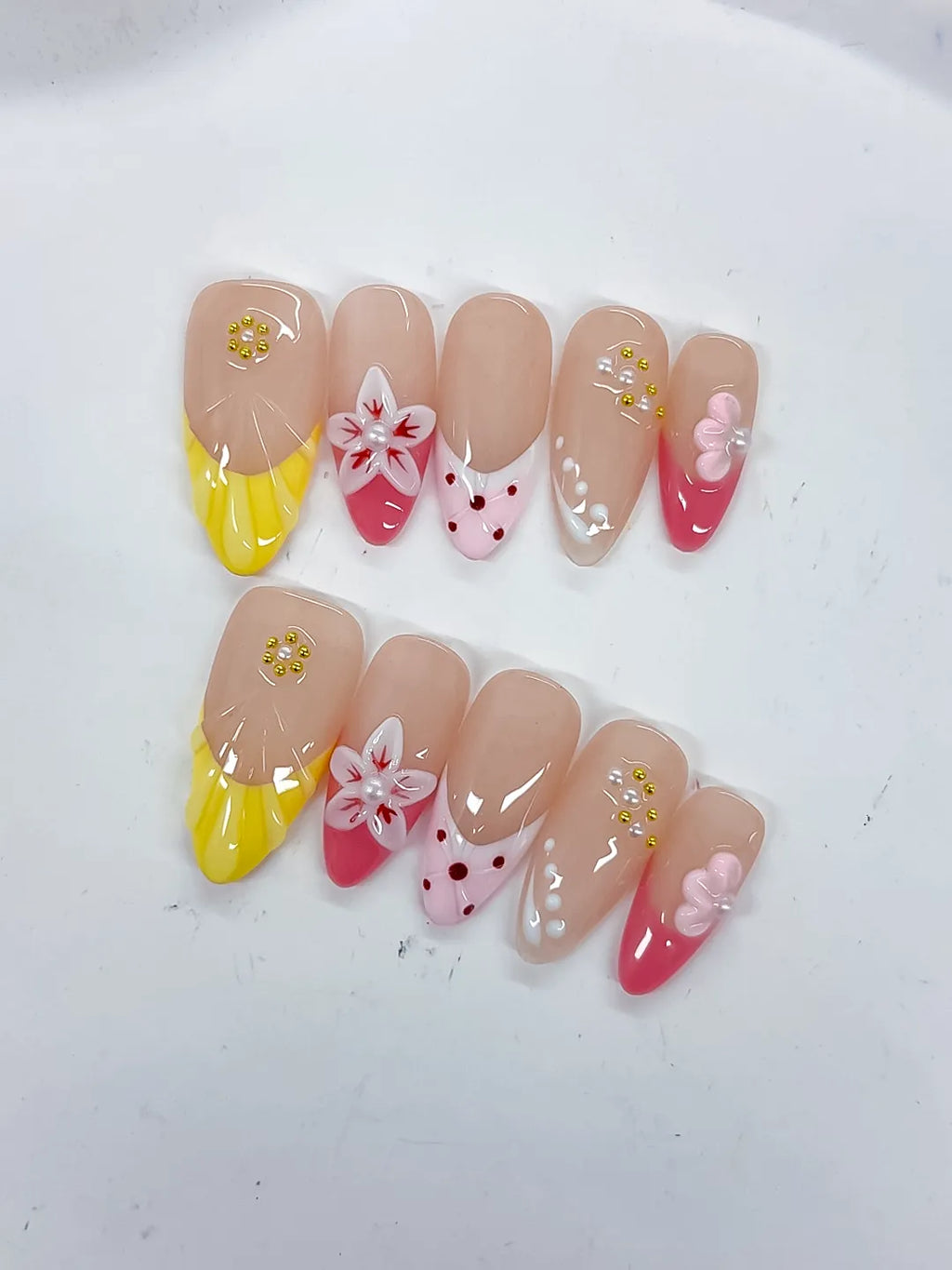 Nude Yellow Pink White Abstract Flower Dot Pattern Stud press on nails close up