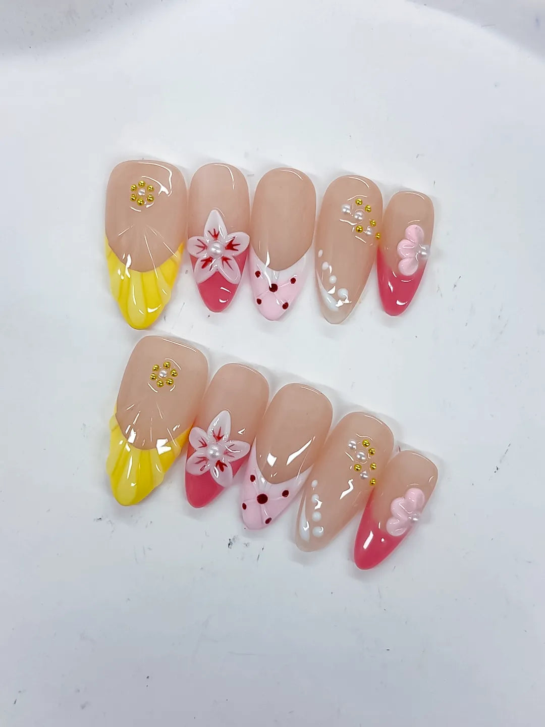 Nude Yellow Pink White Abstract Flower Dot Pattern Stud press on nails close up