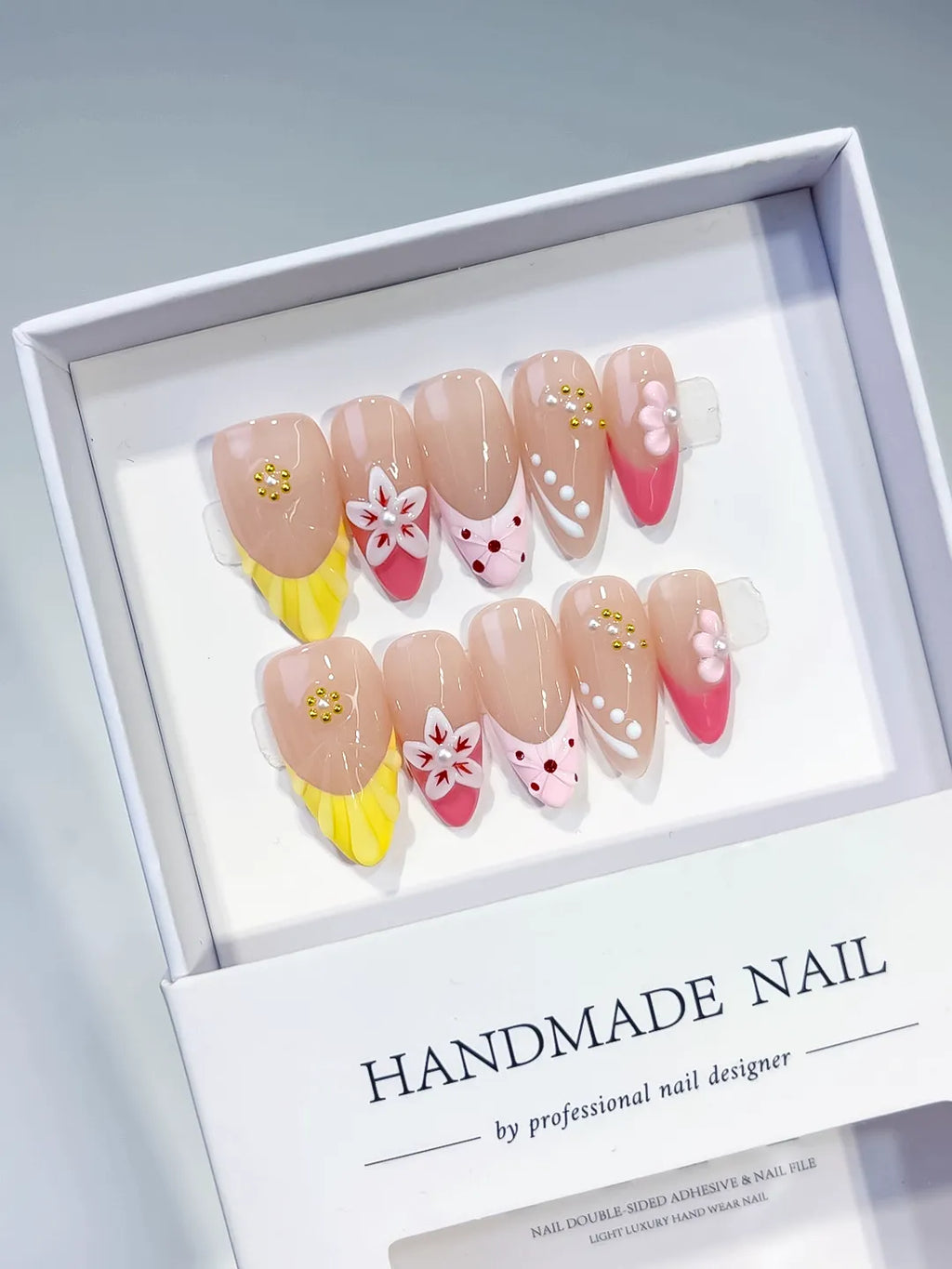 Nude Yellow Pink White Abstract Flower Dot Pattern Stud press on nails angled view