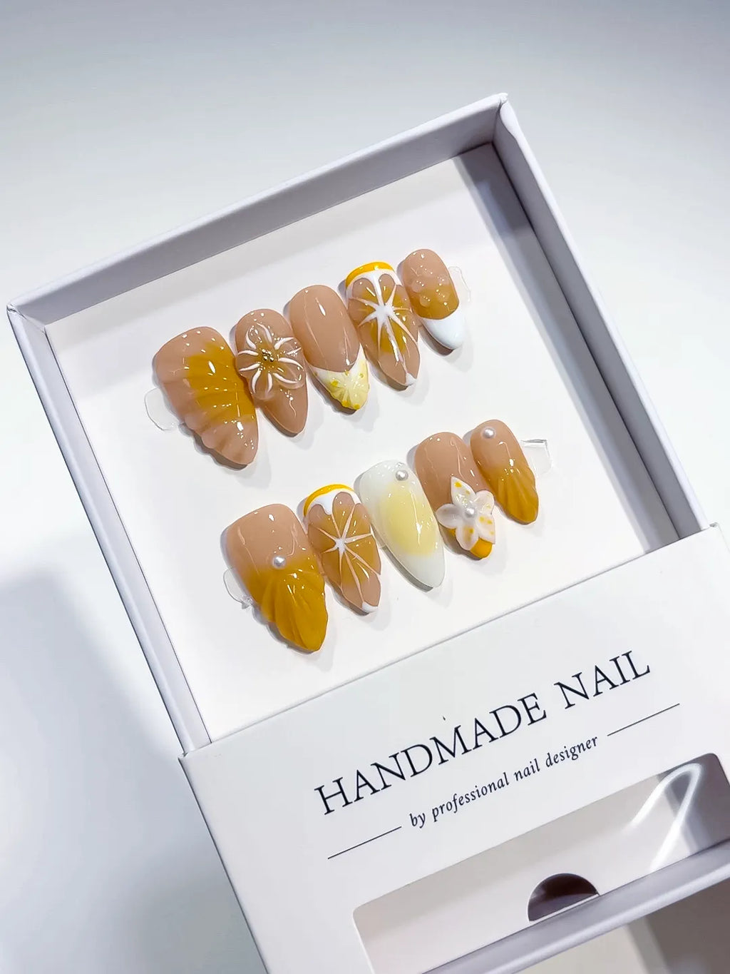 Nude Yellow White French tip Flower Fruit press on nails angled view