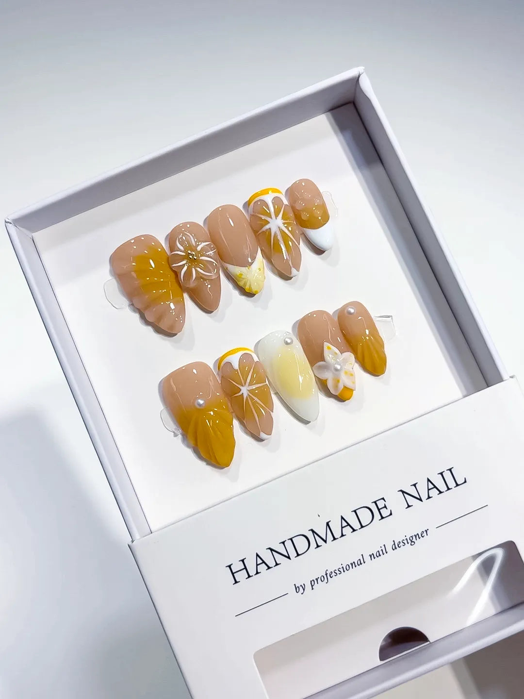 Nude Yellow White French tip Flower Fruit press on nails angled view