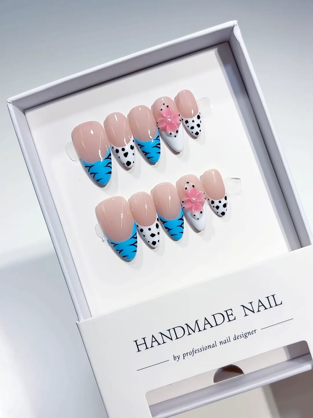 Nude Blue White Pink French tip Flower Dot Pattern Animal Print press on nails angled view