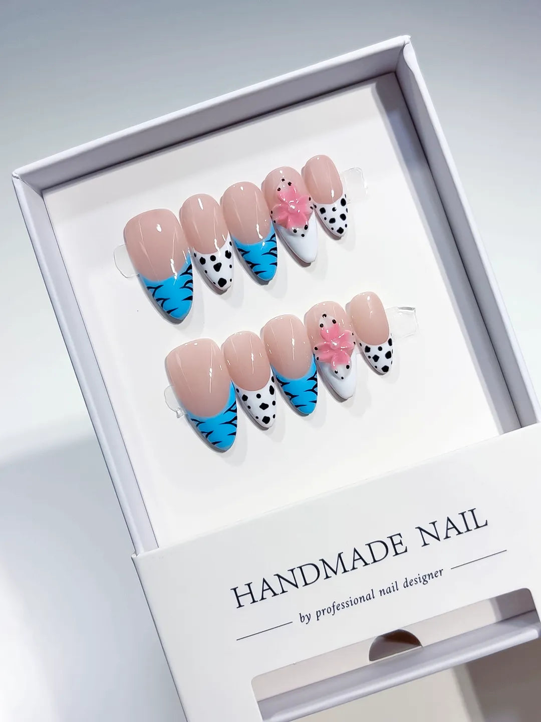 Nude Blue White Pink French tip Flower Dot Pattern Animal Print press on nails angled view