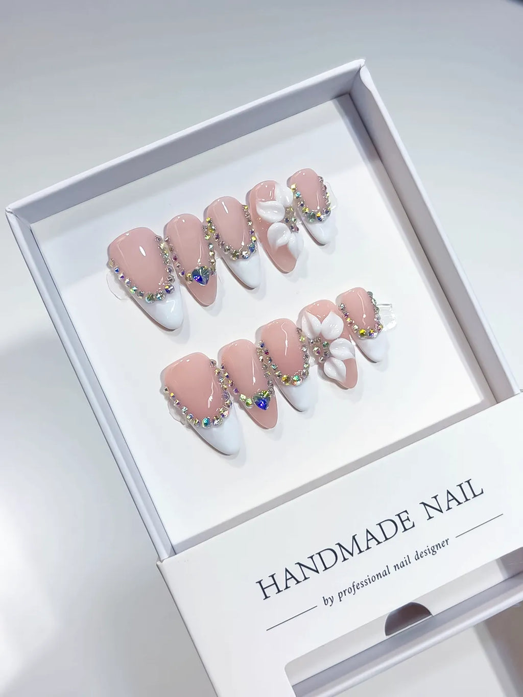 Nude White Silver French tip Flower Rhinestone press on nails angled view