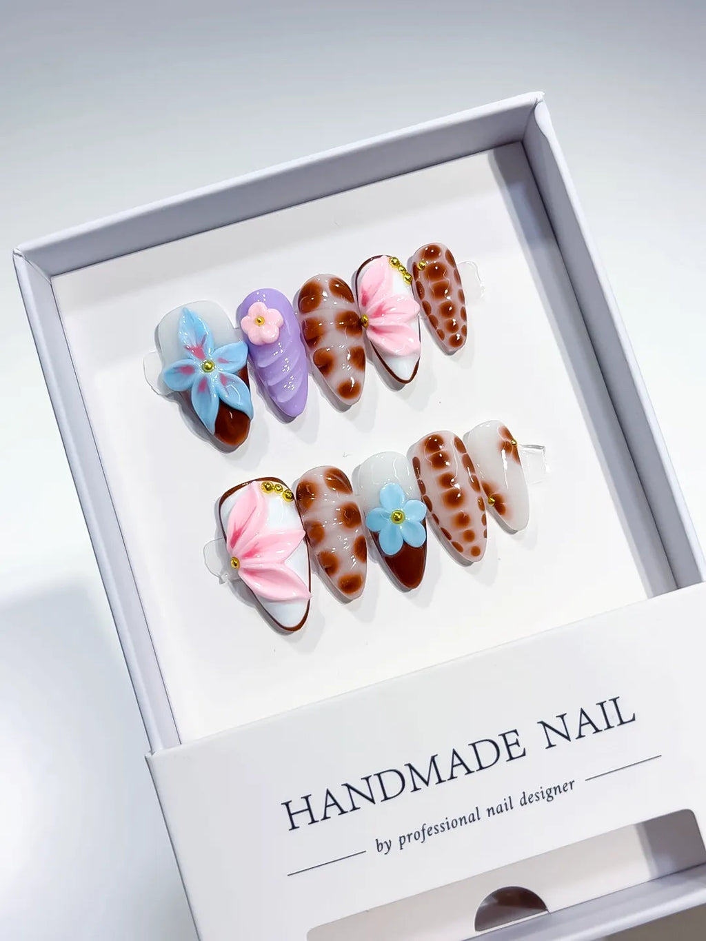 White Brown Pink Blue Purple Abstract Flower Dot Pattern press on nails angled view