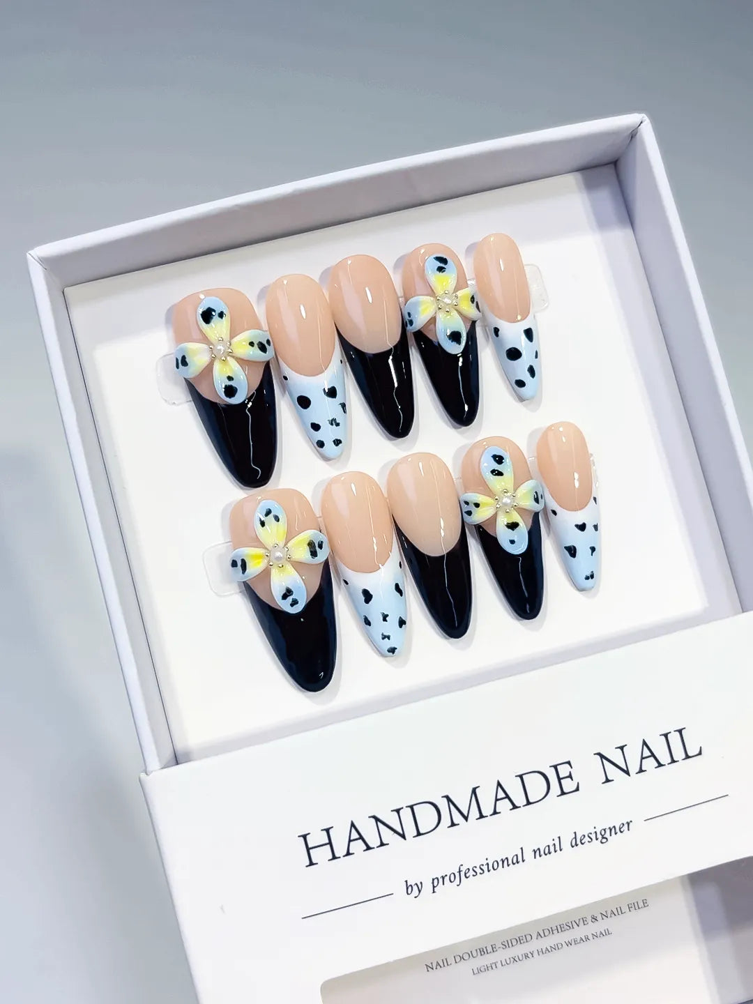 Nude Black White Yellow French tip Flower Heart press on nails angled view