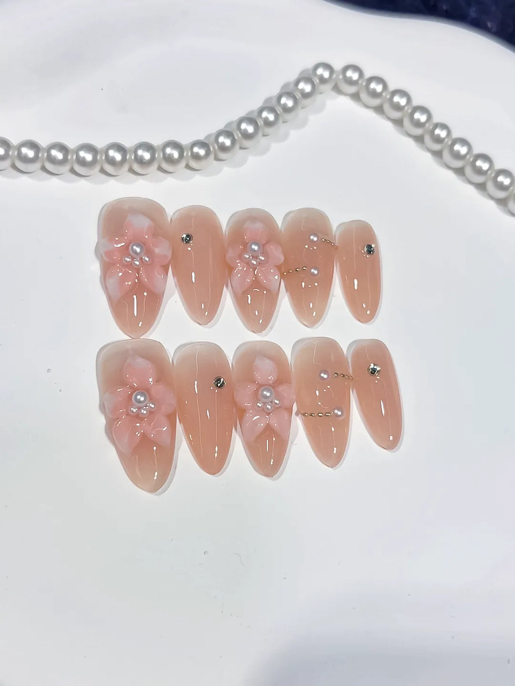 Nude Pink Silver Solid color Flower Pearl Rhinestone press on nails close up