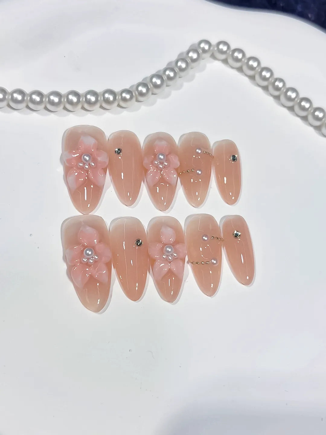 Nude Pink Silver Solid color Flower Pearl Rhinestone press on nails close up