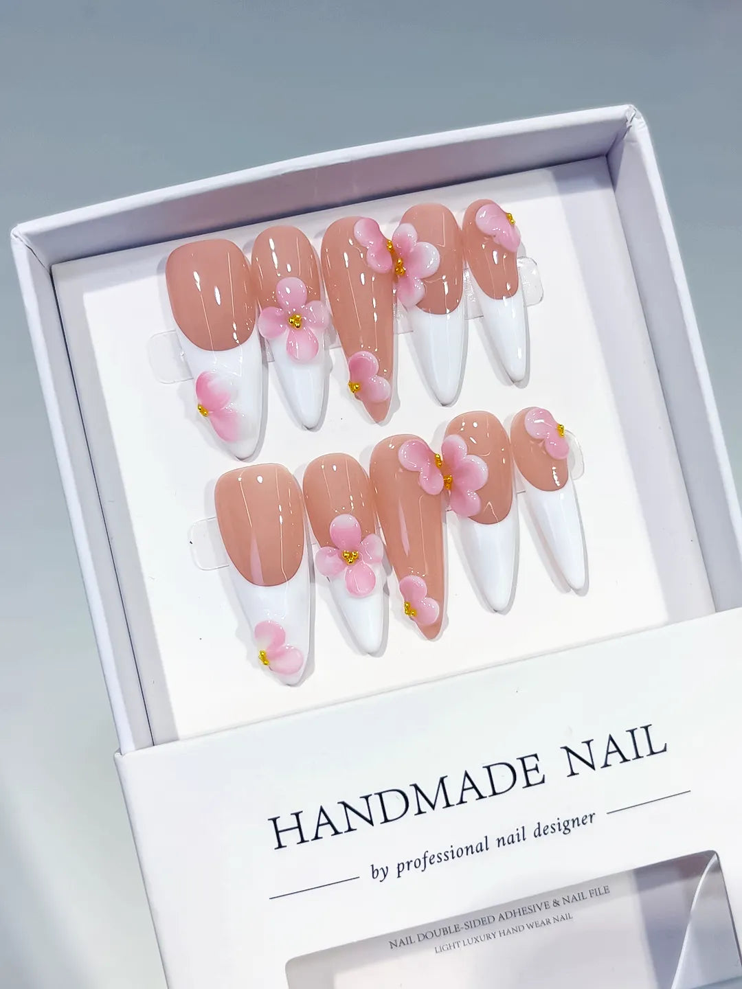 Nude White Pink French tip Flower press on nails angled view