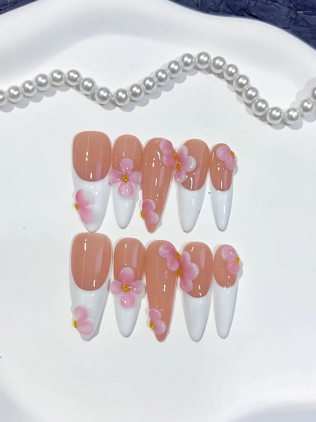 Nude White Pink French tip Flower press on nails close up