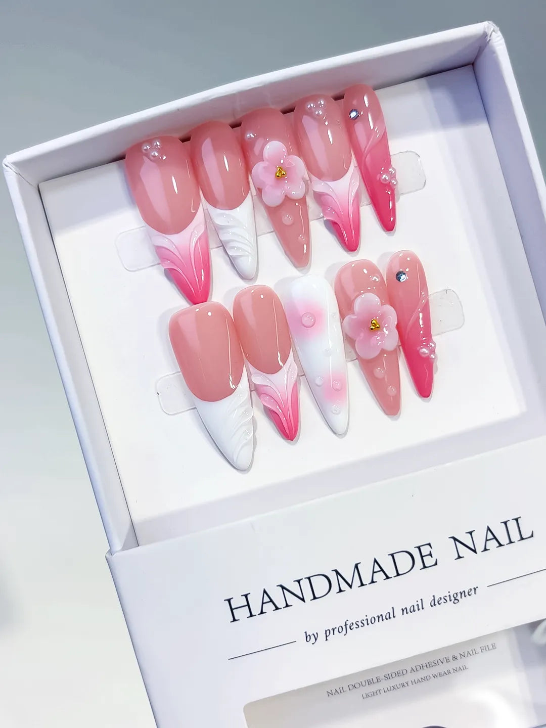 Pink White French tip Flower Shell Rhinestone press on nails angled view